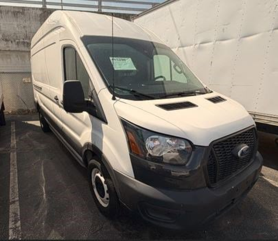 Ford Transit cargo van cab chassis in-service showing front and passenger side with grille and headlights