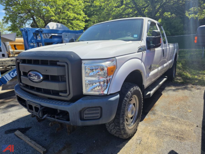 Front-left view of a 2016 Ford F-350 Super Duty pickup truck in-use condition, showing grille with Ford emblem, large bumper, single cab, extended wheel arches, and heavy-duty tires.