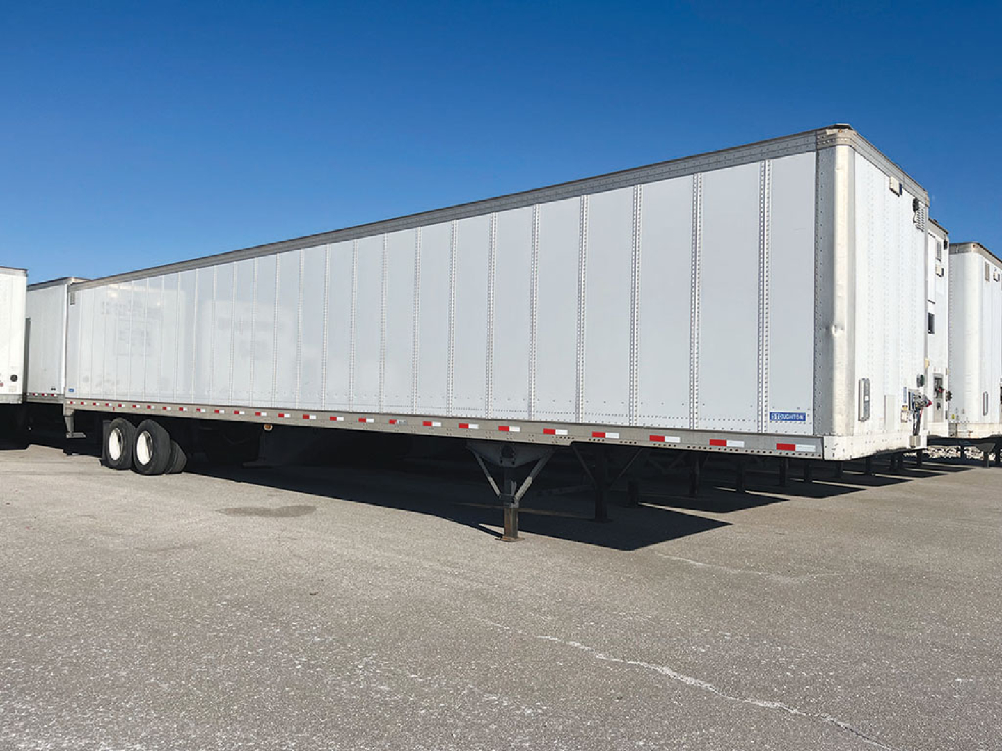 Stoughton dry van trailer with Z-Plate design showing side panels and landing gear.