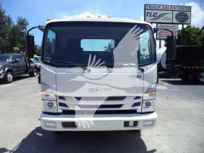 Isuzu NPR truck front view showing windshield and grille in a dealership lot.