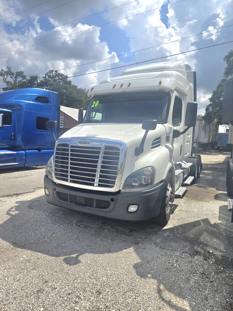 2019 Freightliner Cascadia midroof sleeper cab tractor showing front grille, headlights, and side mirrors.