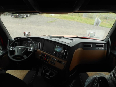 Freightliner Cascadia 126 dash and steering wheel view from cab interior showing dashboard gauges and center console.