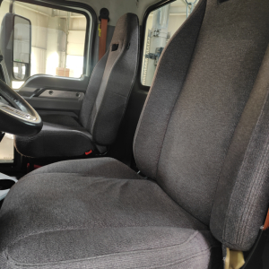 Interior of a 2020 Mack AN64T daycab showing front seats and steering wheel