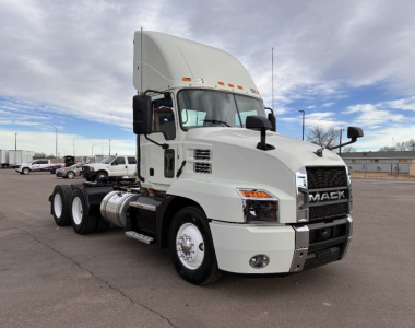 Mack AN64T conventional daycab truck showing cab, front grille with MACK logo, and dual rear axles.