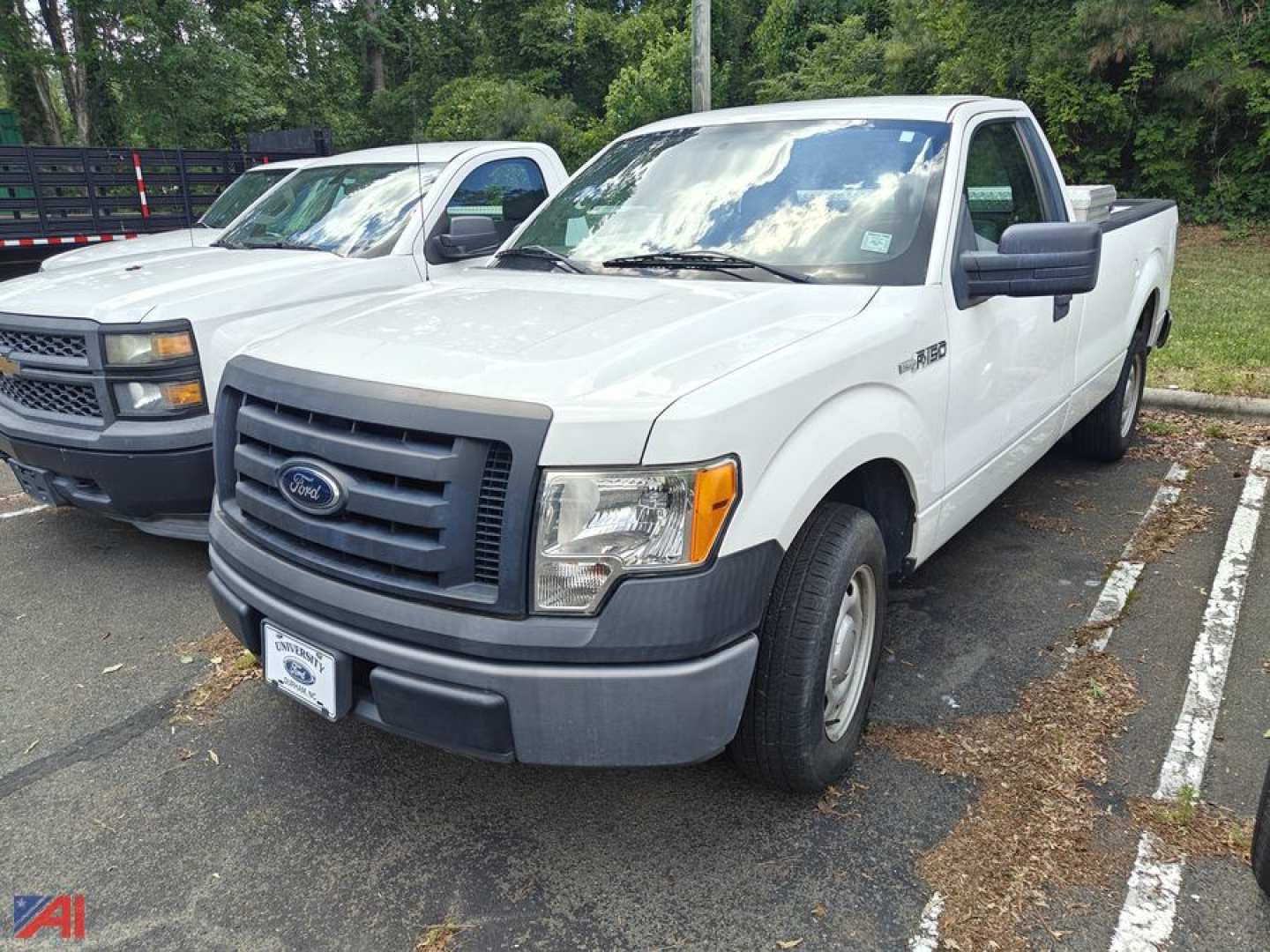 Ford F-150 pickup truck 2012 white cab view showing front grille and bumper