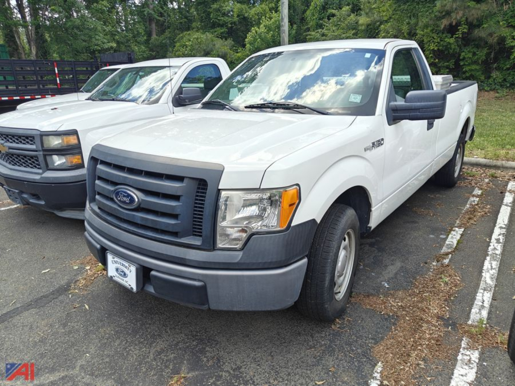 Ford F-150 pickup truck 2012 white cab view showing front grille and bumper