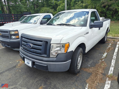 Ford F-150 pickup truck 2012 white cab view showing front grille and bumper