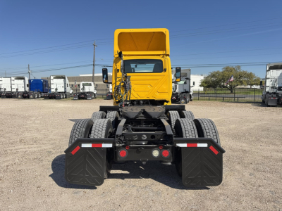 2019 International LT truck rear view showing fifth-wheel area and dual rear axles with mud flaps.