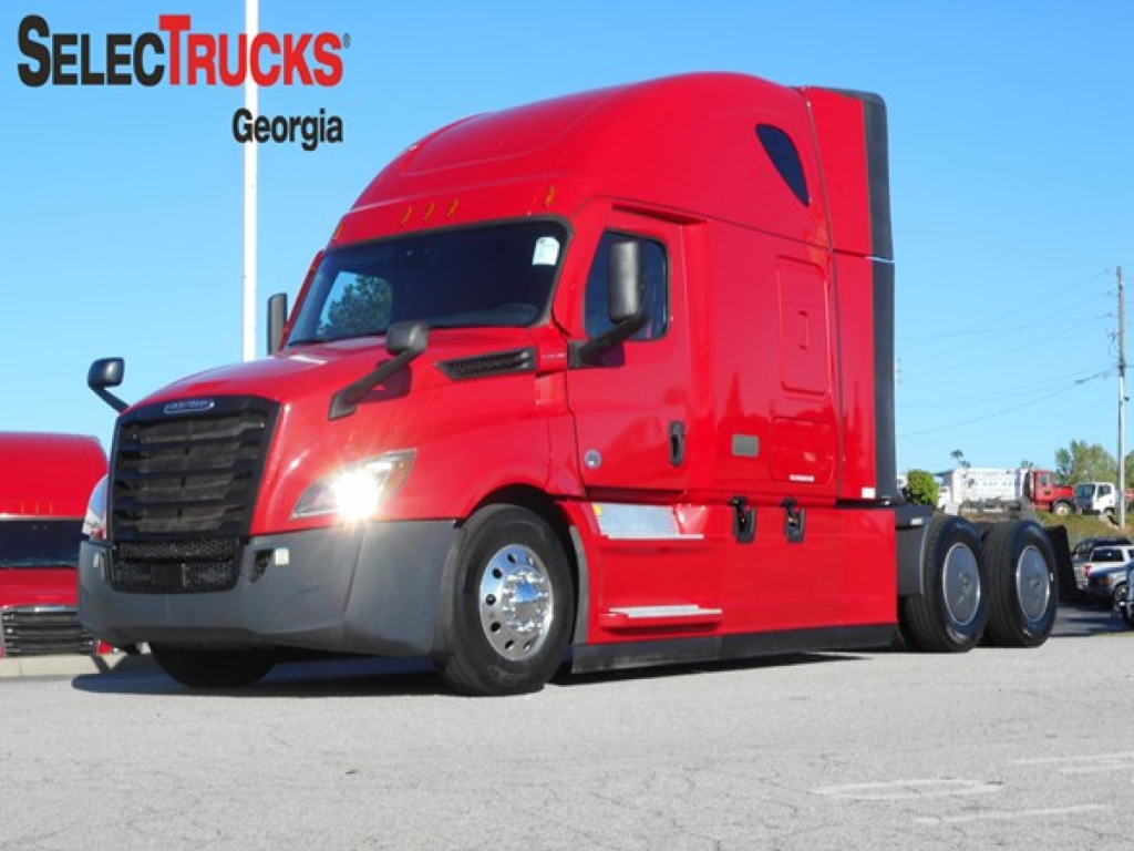 Freightliner Cascadia 126 sleeper tractor in red, front three-quarter view with SelectTrucks Georgia logo