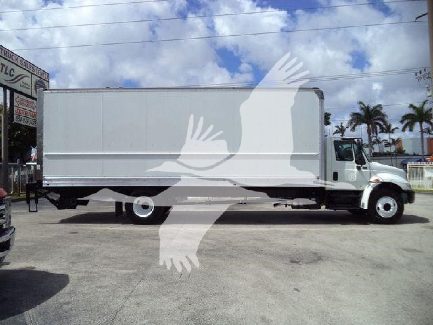 2019 International 4300 box truck side view showing cargo box and cab with a watermark image overlay.