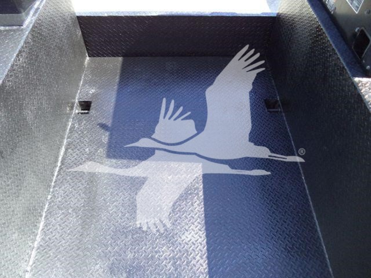 Kenworth T270 cargo bed interior including diamond plate surface and side walls.