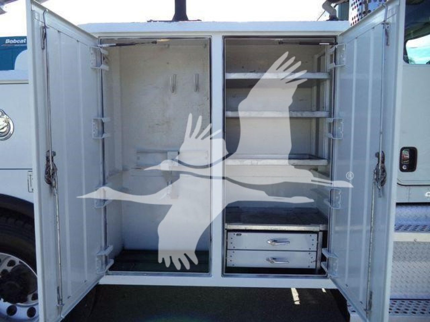 Kenworth T270 service body with rear storage compartments open showing shelves and drawers, utility truck exterior, stock image layout.