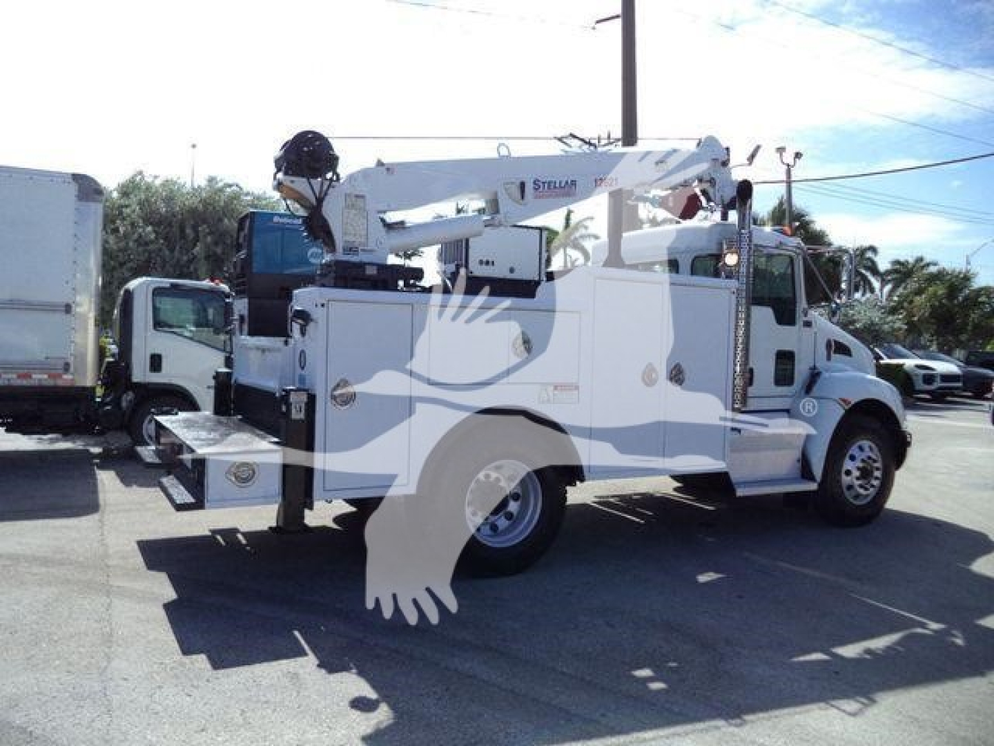Kenworth T270 service truck with crane arm and utility compartments shown in profile