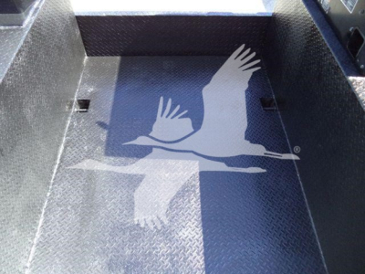 Kenworth T270 cargo bed interior including diamond plate surface and side walls.