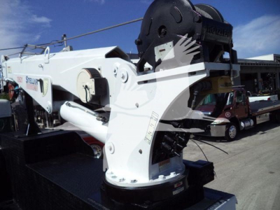 Kenworth T270 service truck crane assembly with white mount and hydraulic crane arm.