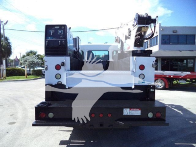 Kenworth T270 truck rear view with crane, rear bumper, lights, and warning sticker visible.
