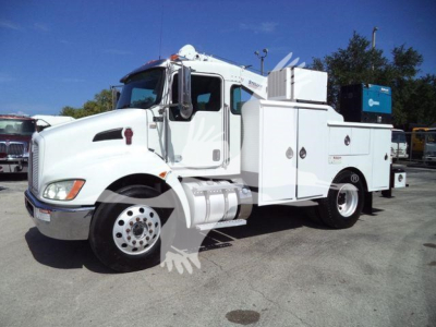 Kenworth T270 utility/service truck in white, side view showing tool compartments, fuel tanks, and a large equipment box in rear.