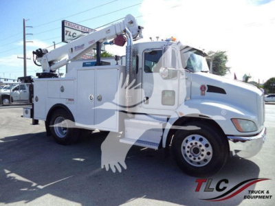 Kenworth T270 service truck with crane, side compartments, white exterior, cab view, DOT mirrors, front fender and wheel.