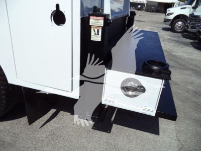 Kenworth T270 service truck side with a mounted toolbox drawer open showing a circular access panel and steps.