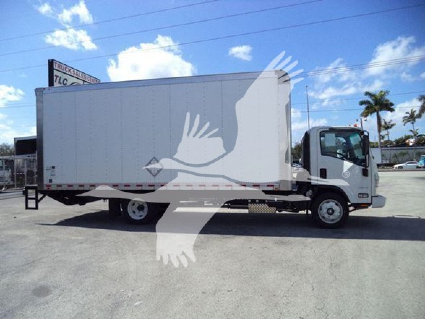 Isuzu NPR box truck silhouette showing cargo box and cab from side view.