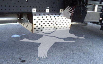 Underbody view of Isuzu NPR truck showing exhaust, metal skid plate, and wiring with perforated guard.