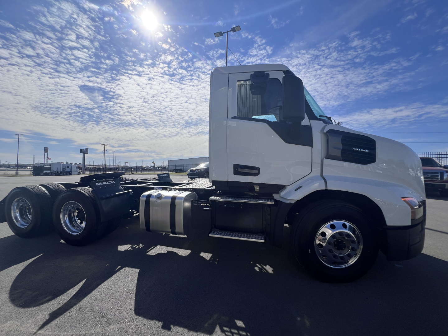 Mack AN64T truck side view showing cab and chassis with fuel tanks and wheels visible