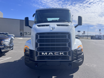 Front view of a white Mack AN64T truck showing the large grille, MACK logo, and headlights; black front bumper and side mirrors.
