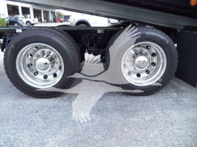 Kenworth T880 rollback truck rear wheels showing chrome rims and dual tires
