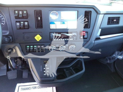 Dashboard interior of 2025 Kenworth T280 showing instrument cluster, controls, and center console.