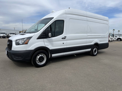 Ford Transit van showing full side profile with cargo cargo area, no visible logos beyond standard Ford grille