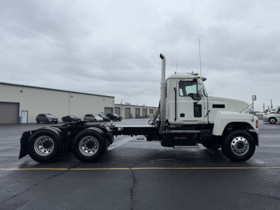 Truck: 2026 Mack PI64T conventional daycab tractor in side profile showing chassis and dual rear axles.