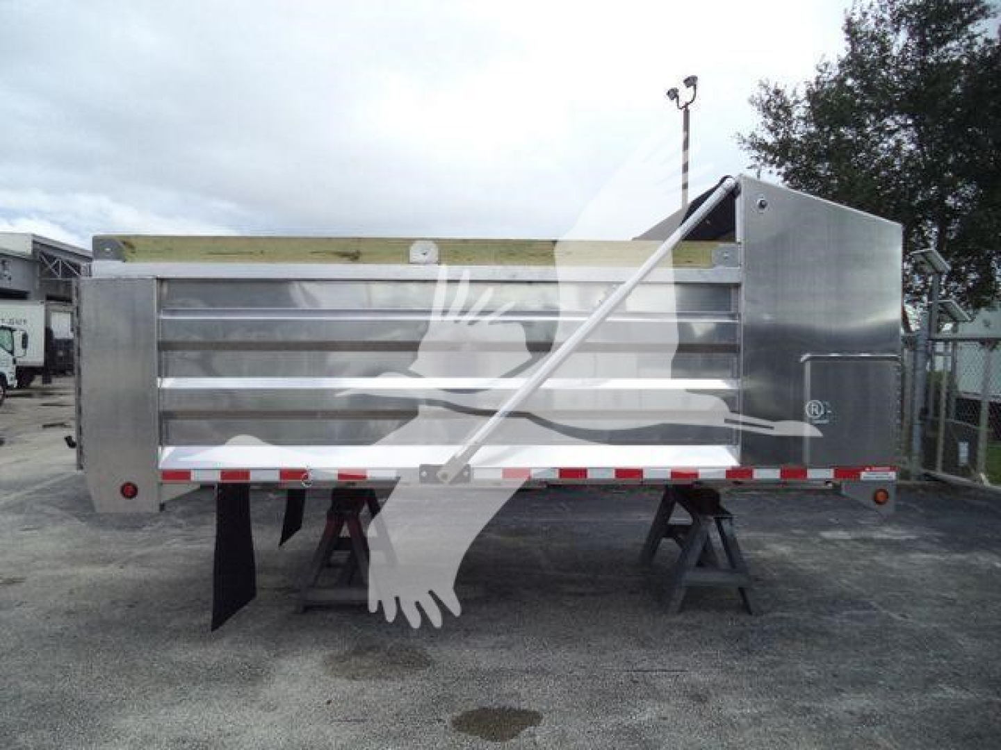 Dump truck bed showing aluminum 14 ft dump body with side panels and tailgate, stock number ADFAB14FTALUM1, category Dump, new unit.