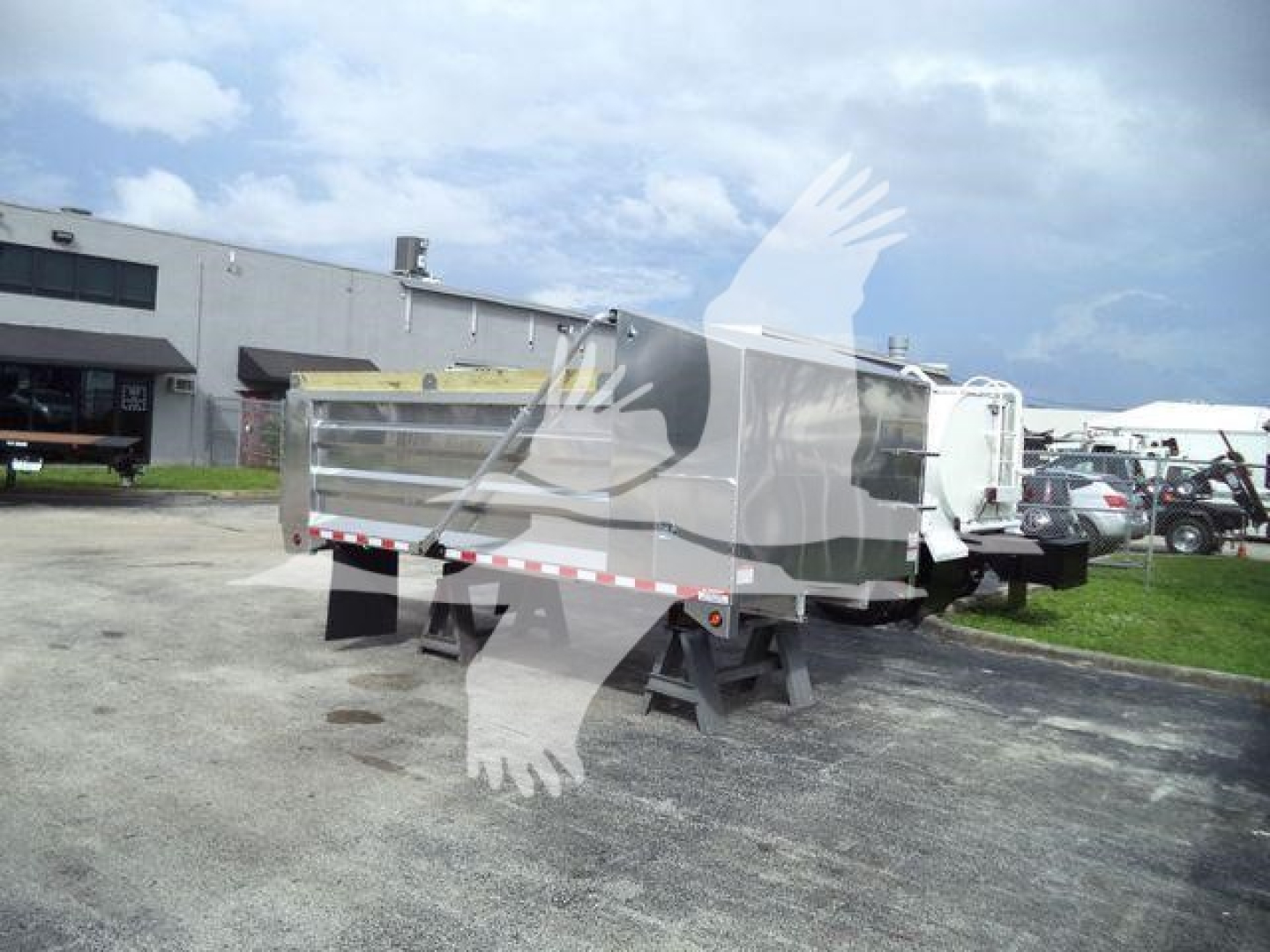 Dump truck bed trailer by Advanced Fabricators 14 ft aluminum side dump in data center lot, stock number ADFAB14FTALUM1, category Dump, new unit.