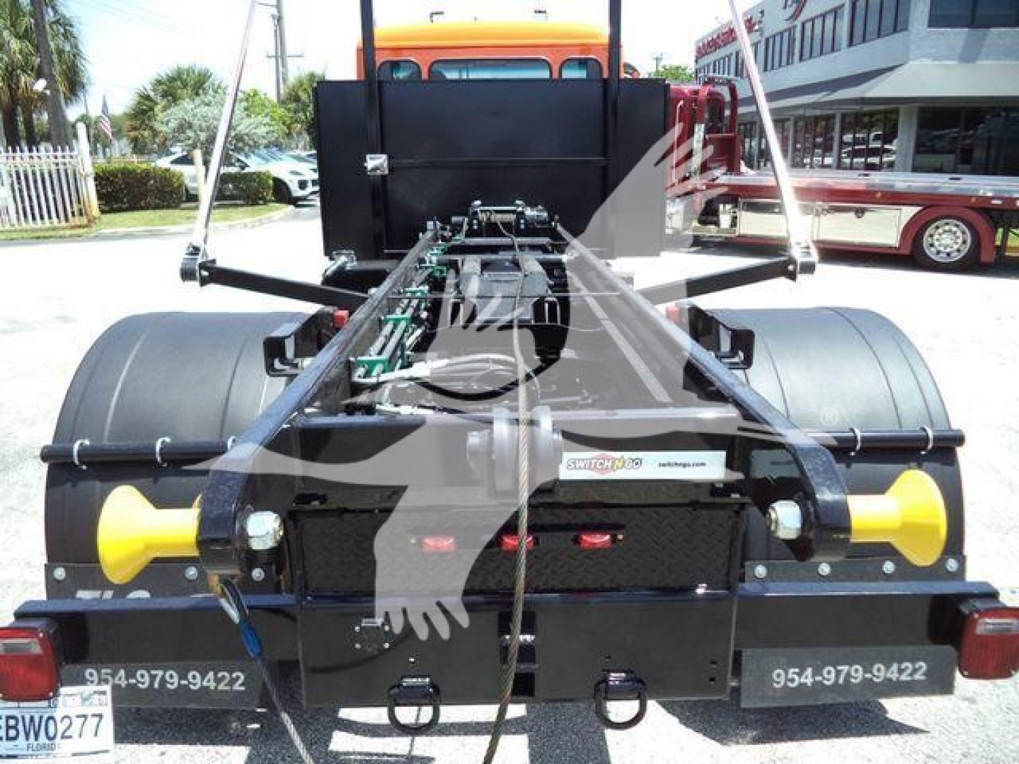 Peterbilt 536 truck chassis view showing rear frame rails and fifth wheel mounting area with yellow rear reflectors.