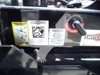 Peterbilt 536 interior controls with Switch-N-Go labels and safety stickers showing operation and maximum rating.