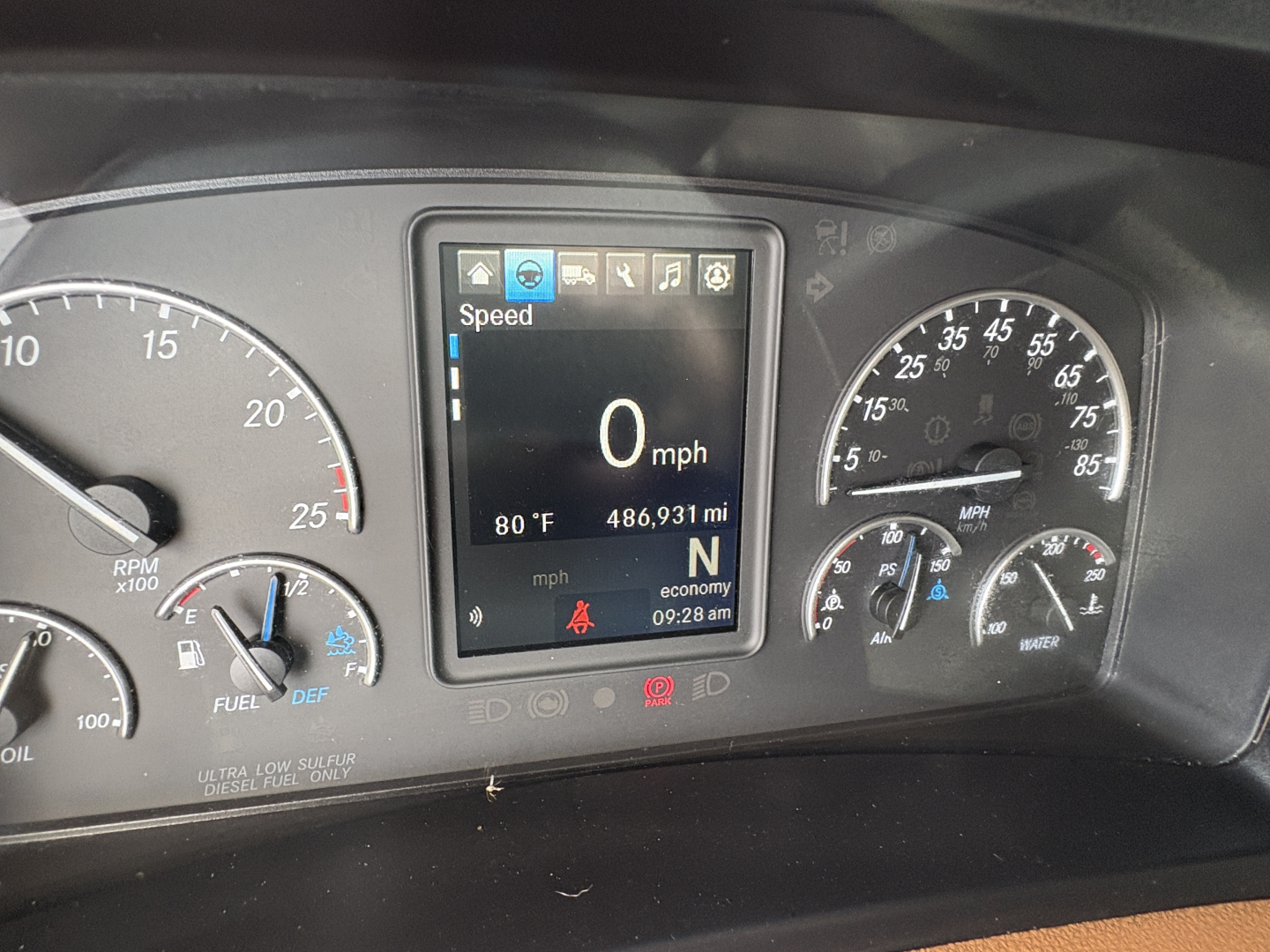 Dashboard of a 2022 Freightliner Cascadia 126 showing digital display with speed 0 mph, 80°F, 486,931 mi, gear N, and various gauges.