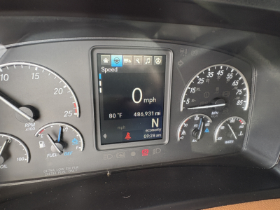 Dashboard of a 2022 Freightliner Cascadia 126 showing digital display with speed 0 mph, 80°F, 486,931 mi, gear N, and various gauges.