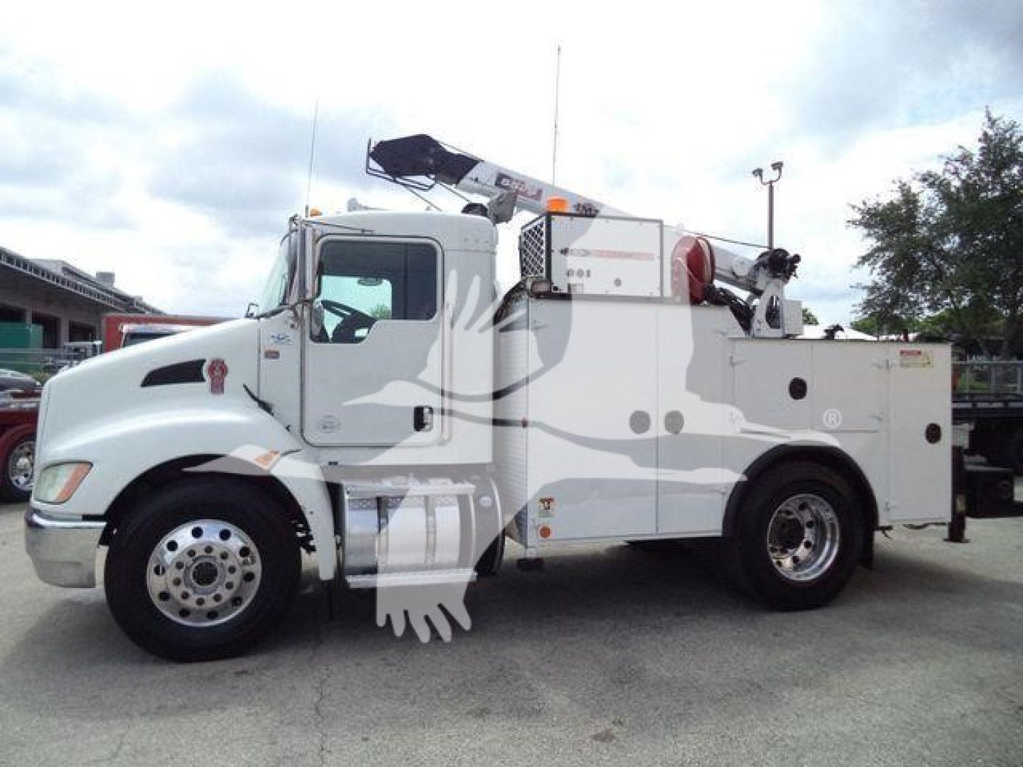Kenworth T270 service truck side view showing utility body and equipment compartments.