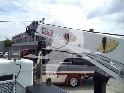 Kenworth T270 service truck crane arm with IMT logo and model 5525 visible, side reveal showing machinery and wheel, VIN and stock info not shown on image