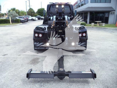 Tow truck rear view with winch attachment and hitch, International MV, VIN 3HAEUMMLXSL178070, stock J78070.