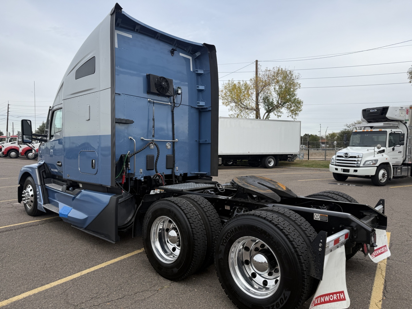 Kenworth T680 truck cab and rear view showing sleeper cab and chassis with dual rear axles.