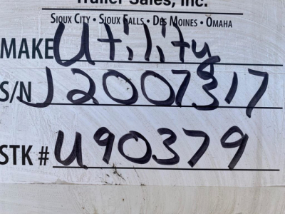Trailer label showing stock number U90379 and S/N 2007317 handwritten, with Make Utity and various city names; 2018 Utility Reefer trailer in-service.