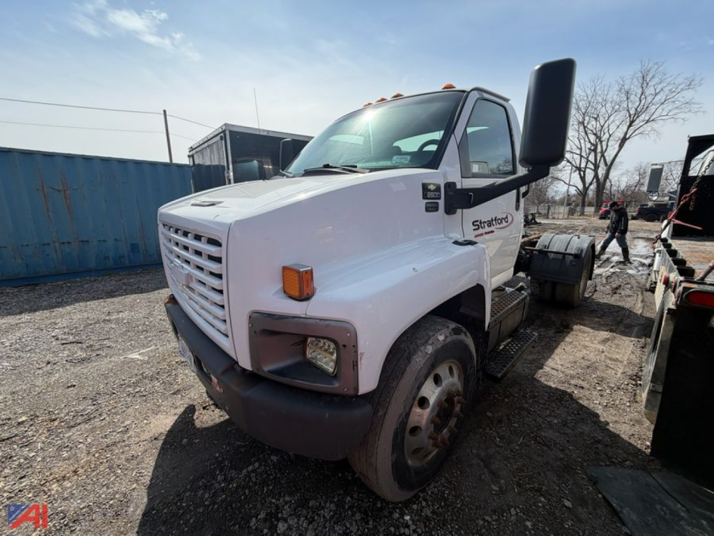 Chevrolet Kodiak C6500 cab and chassis truck with white body viewed from front-right angle.