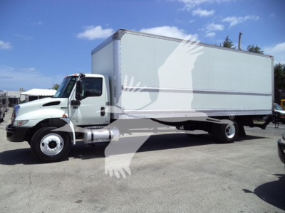 Box truck 2021 International MV in-service displaying a large cargo box on a cab-forward chassis, white with smooth side, front grille and wheelbase visible.