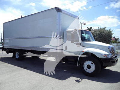 International MV box truck showing cargo box and cab with wheels visible.