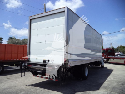 Box truck rear and side view showing large enclosed cargo area on a white 2021 International MV with stock number T83478, VIN 3HAEUMMLXML683478.