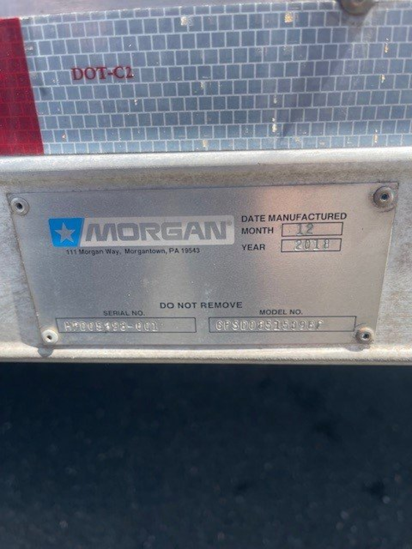 Morgan date manufactured plate on rear with DOT-C1 label, serial number and model number fields, shows manufactured month/year 2018? and VIN portion obscured.