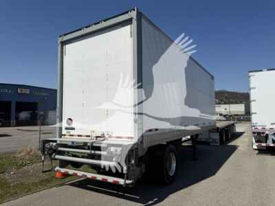  trailer showing rear and side of 2018 Great Dane Pup van trailer with stock number 7652 and VIN visible