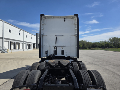 Kenworth T680 rear view showing chassis and dual rear axles with tires