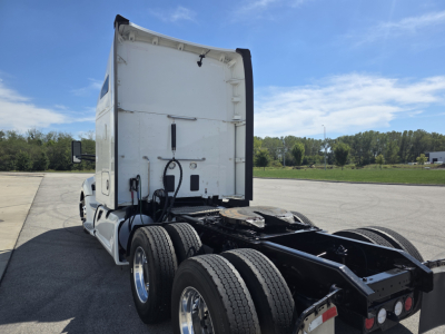 Kenworth T680 truck cab and chassis rear view showing 6 wheels and frame rails with 2022 model information not visible on the image